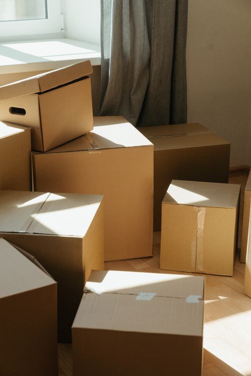 Cardboard boxes ready to be opened and assembled